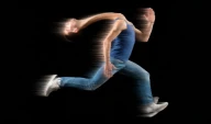 Person running so fast that the head is behind the body.